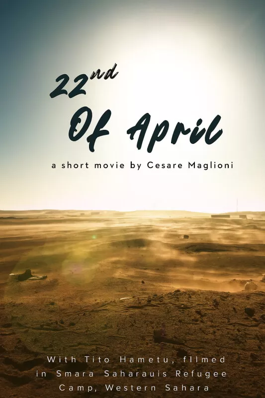 Αφίσα ταινίας για το "22nd Of April" δείχνει έναν φωτεινό, θολό ουρανό πάνω από ένα απέραντο, αμμώδες τοπίο ερήμου με σκόνη να φυσάει. Ο τίτλος της ταινίας εμφανίζεται ευδιάκριτα με μαύρη γραφή.